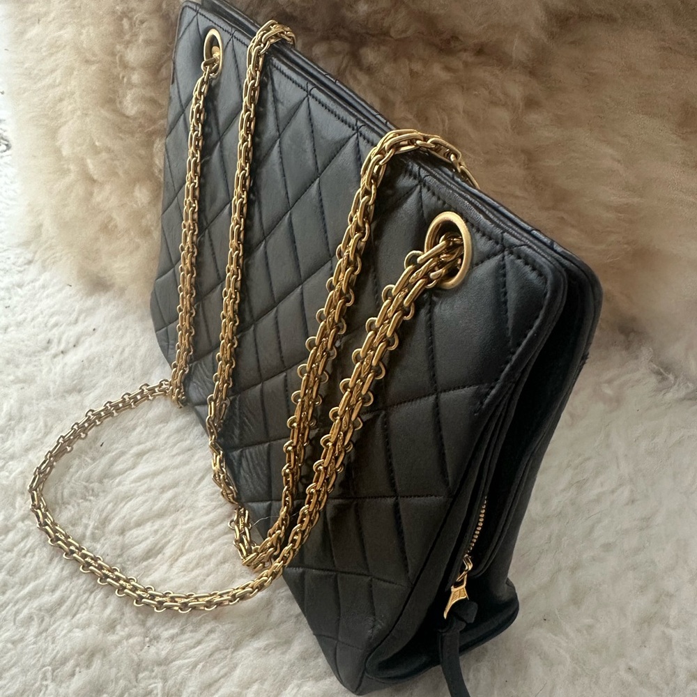 CHANEL Black and Gold Quilted Shoulder Bag